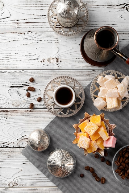 Free Photo delicious sweets and coffee cup top view