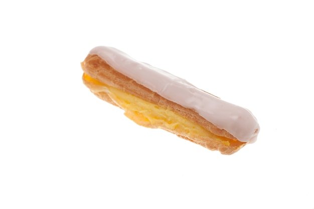 Delicious white glazed eclaire over white background, Sweet dessert