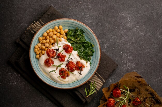 Delicious yougurt meal with chickpeas and dried tomatoes