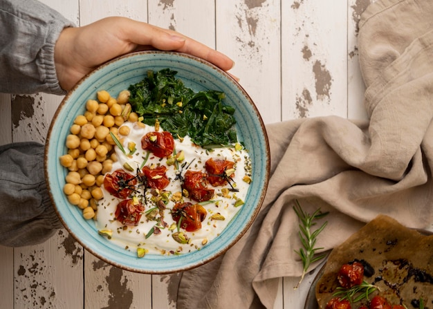 Delicious yougurt meal with chickpeas and dried tomatoes