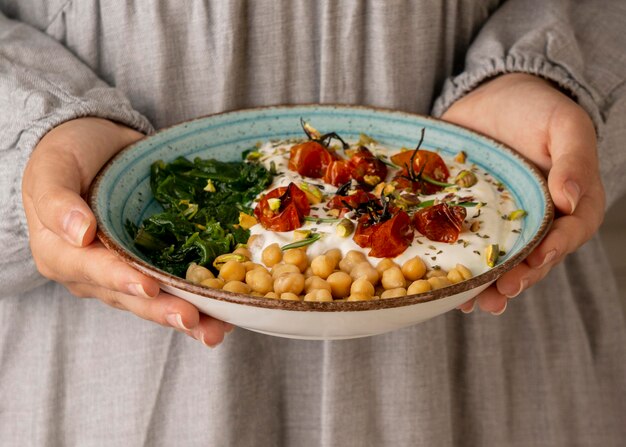 Delicious yougurt meal with chickpeas and dried tomatoes