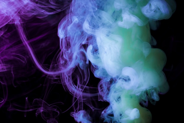 Free Photo dense smoke fragments on a black background