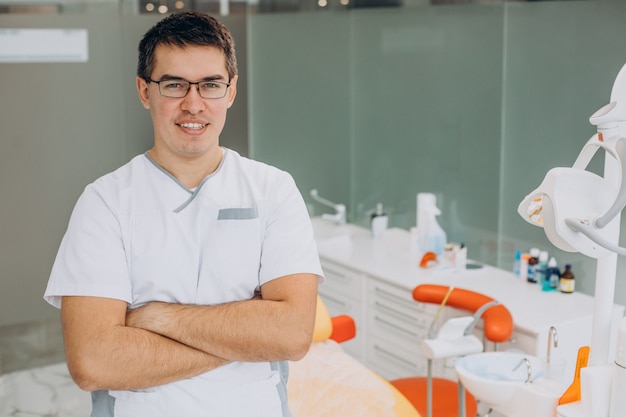 Dental doctor standing at clinic