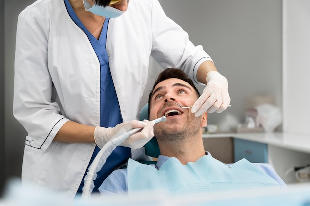 Dentist doing a check up on the patient