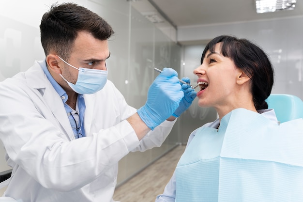 Dentist doing a check up on the patient