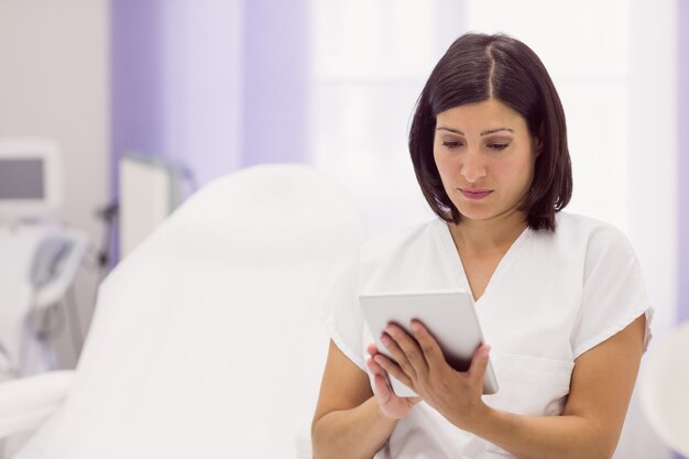 Dermatologist using digital tablet