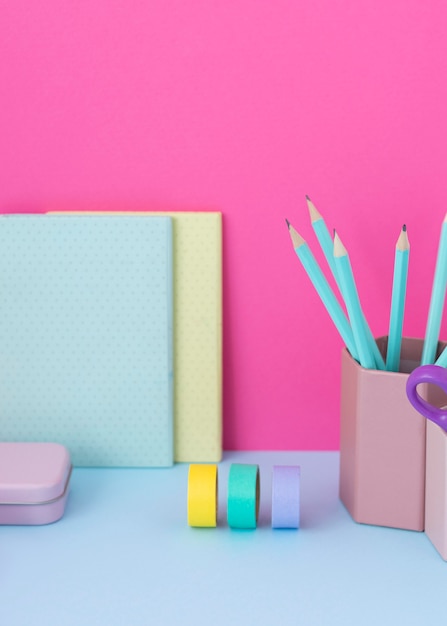 Free photo desk arrangement with colorful tape high angle