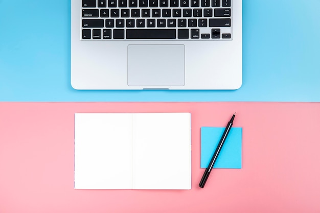 Desk arrangement with empty notepad