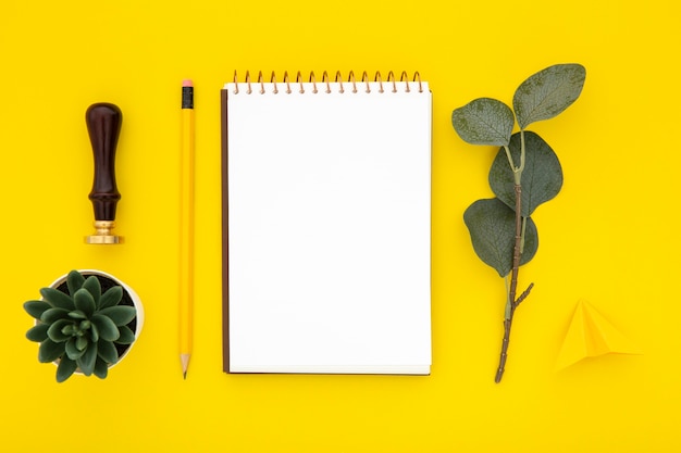 Desk arrangement with empty notepad