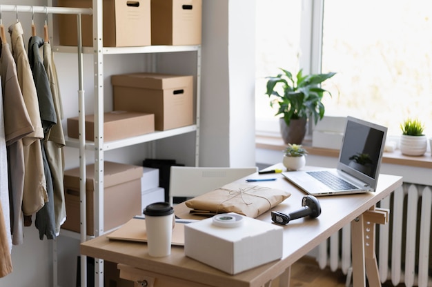 Desk arrangement with laptop and pack