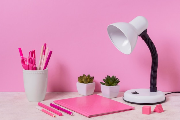 Desk arrangement with pink items