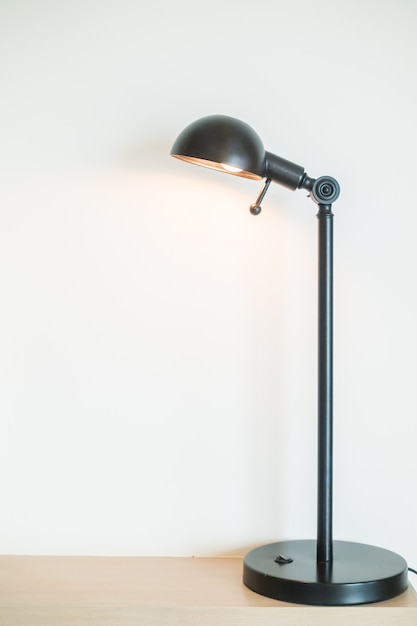 Free photo desk lamp lit