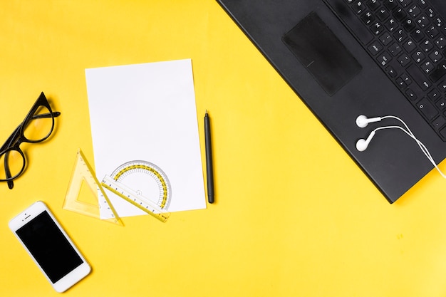 Desk workspace with various elements