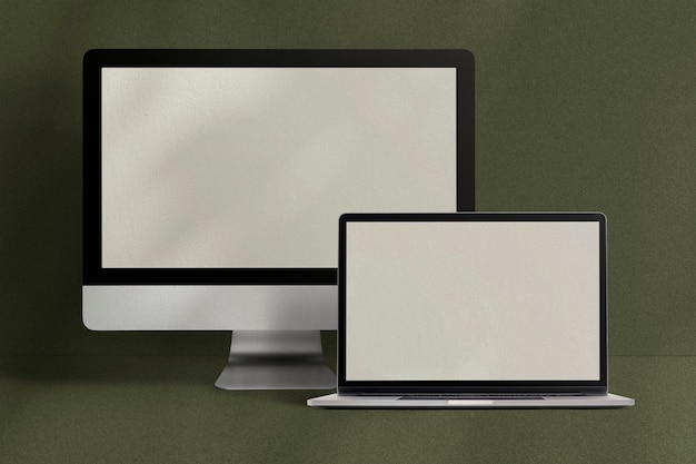 Free photo desktop and laptop screen computer digital device on green background