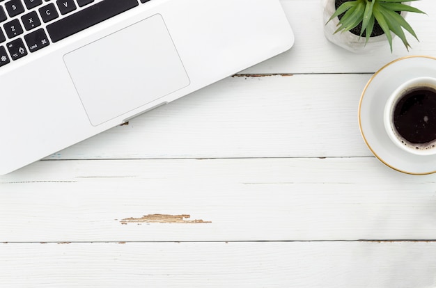 Desktop with computer and coffee cup