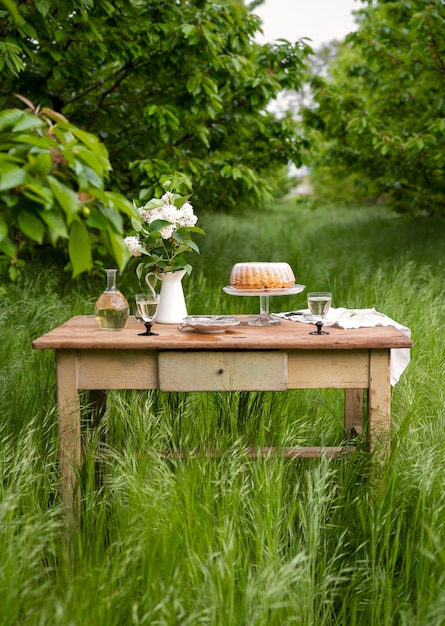 Dessert and flowers on table arrangement