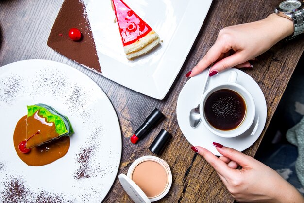 Dessert set with a cup of coffee top view