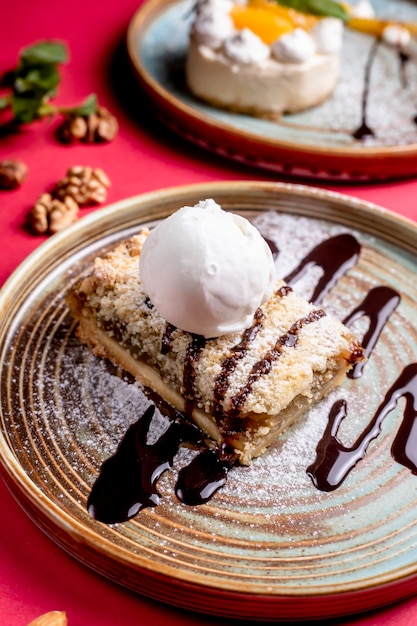 Dessert topped with ice cream and chocolate syrup