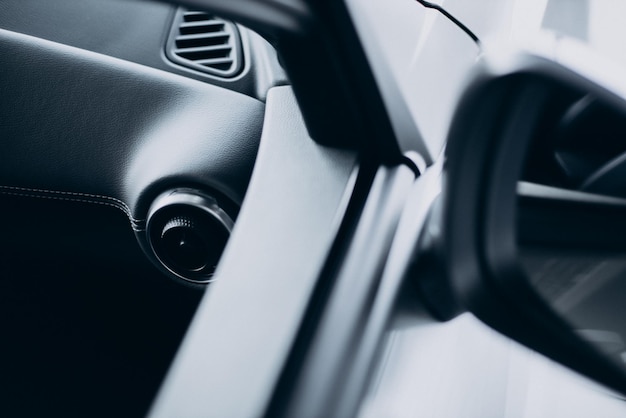 Details of a car standing in car showroom