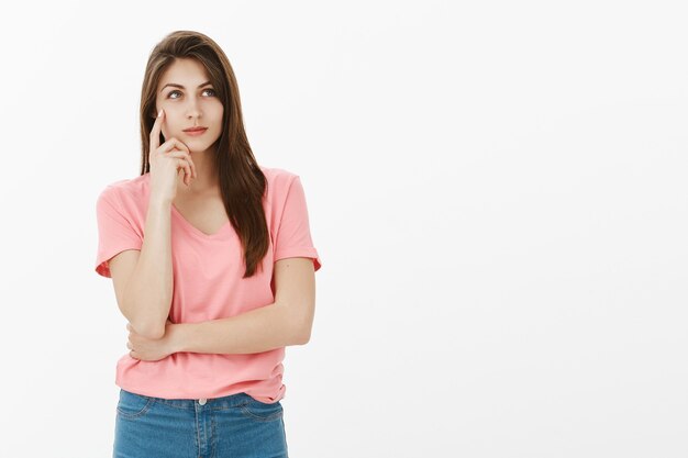 Determined brunette woman posing in the studio