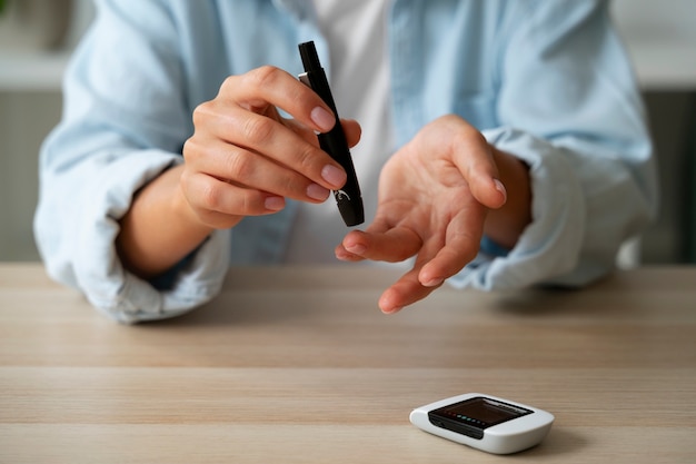 Free photo diabetic person checking their glucose level