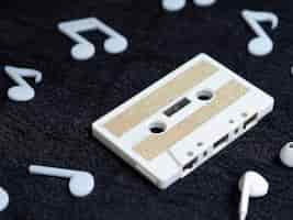 Free photo diagonal view white minimalistic cassette tape