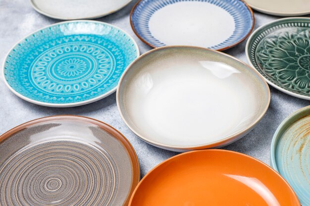 Different ceramic empty plates and bowls.