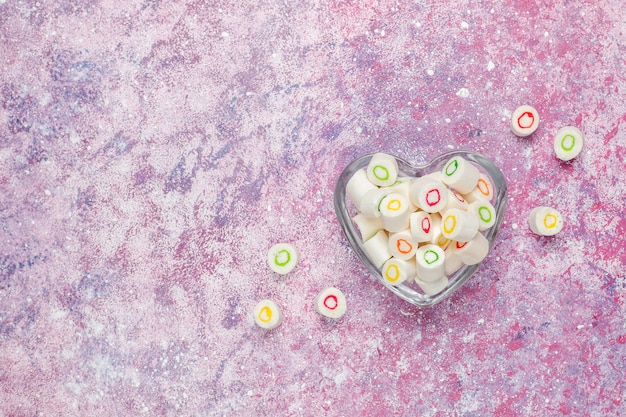 Different colorful sugar candies, top view