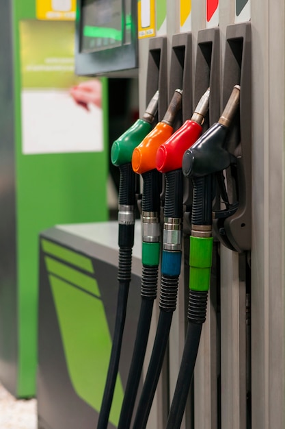 Free Photo different colours gas station pumps