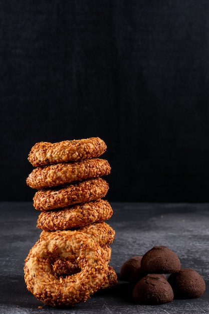 Free photo different cookies on dark table