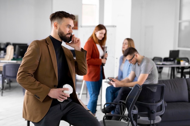 Free Photo different coworkers having a meeting