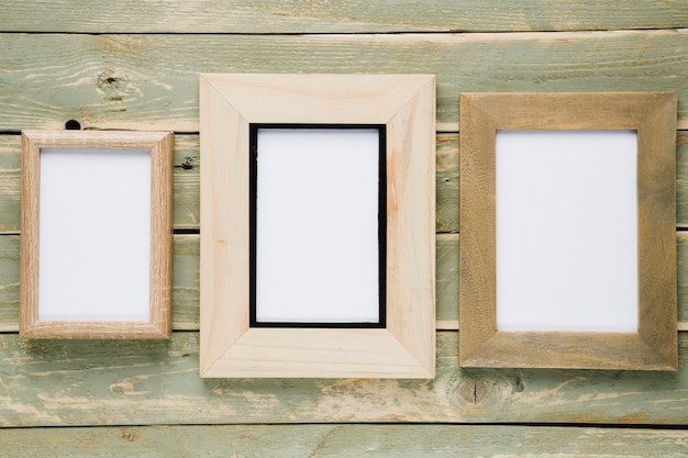 Free photo different dimensions frames with empty space