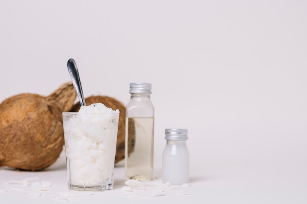 Free photo different forms of coconut oil with copy-space