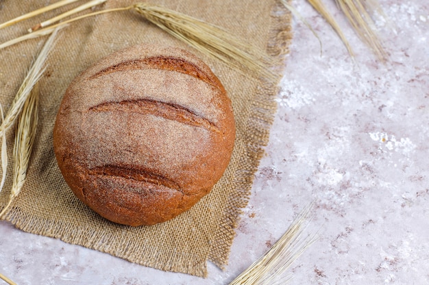 Free photo different kinds of fresh bread as background, top view