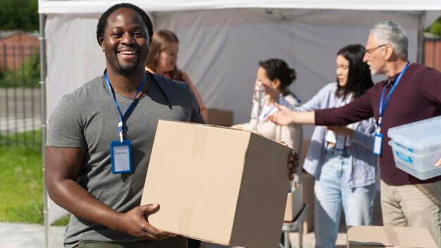 Different people doing volunteer work with food