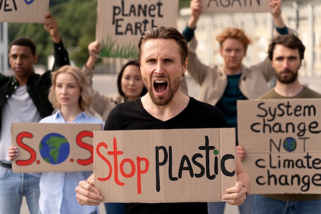 Different people joining a global warming protest