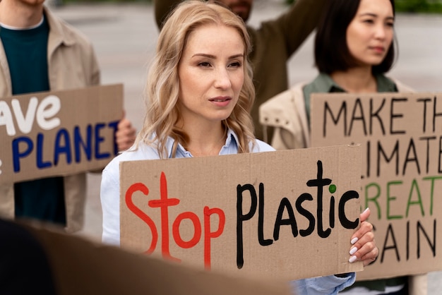 Free photo different people marching in global waring protest