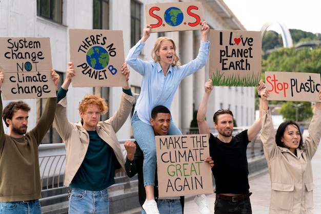 Free photo different people protesting together because of the global warming