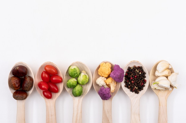 Different vegetables on wood spoons