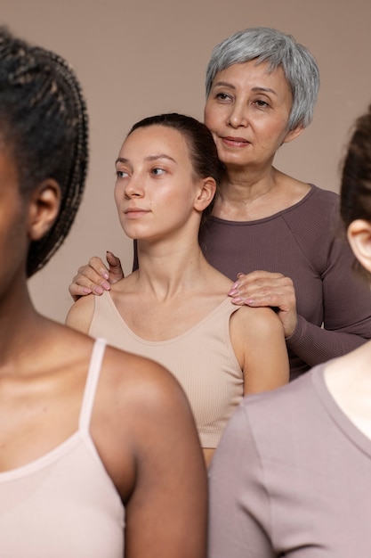 Different women standing together