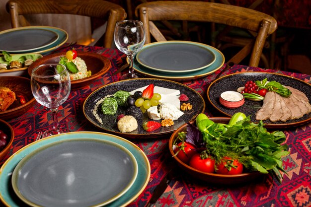 A dinner setup with side dish and salad plates