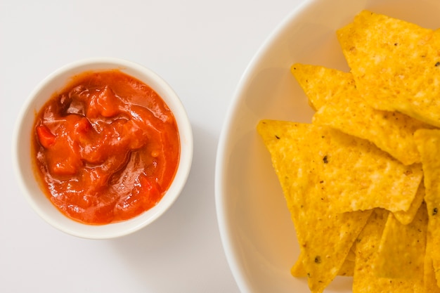 Free Photo dipping nacho chips