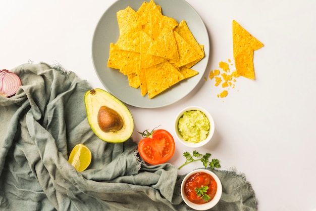 Free Photo dipping nacho chips