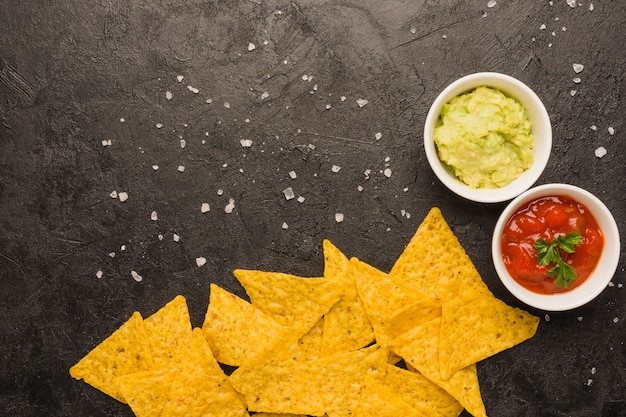 Free Photo dipping nacho chips