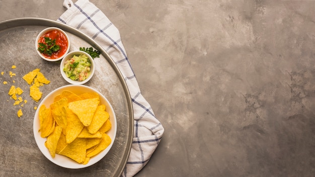 Free Photo dipping nacho chips