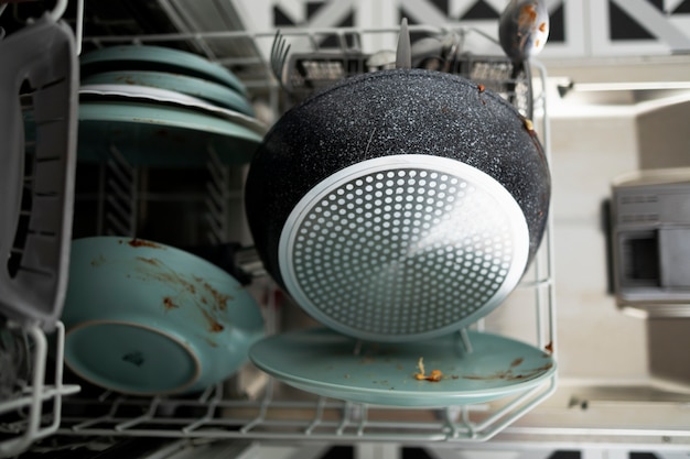 Dirty dishes in washing machine top view