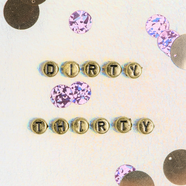 Free Photo dirty thirty, quote with beads