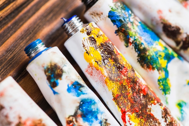 Free photo dirty tubes with paints