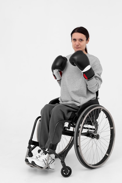 Free Photo disabled boxing player in a wheelchair