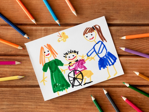 Free Photo disabled child and friends drawn with pencils